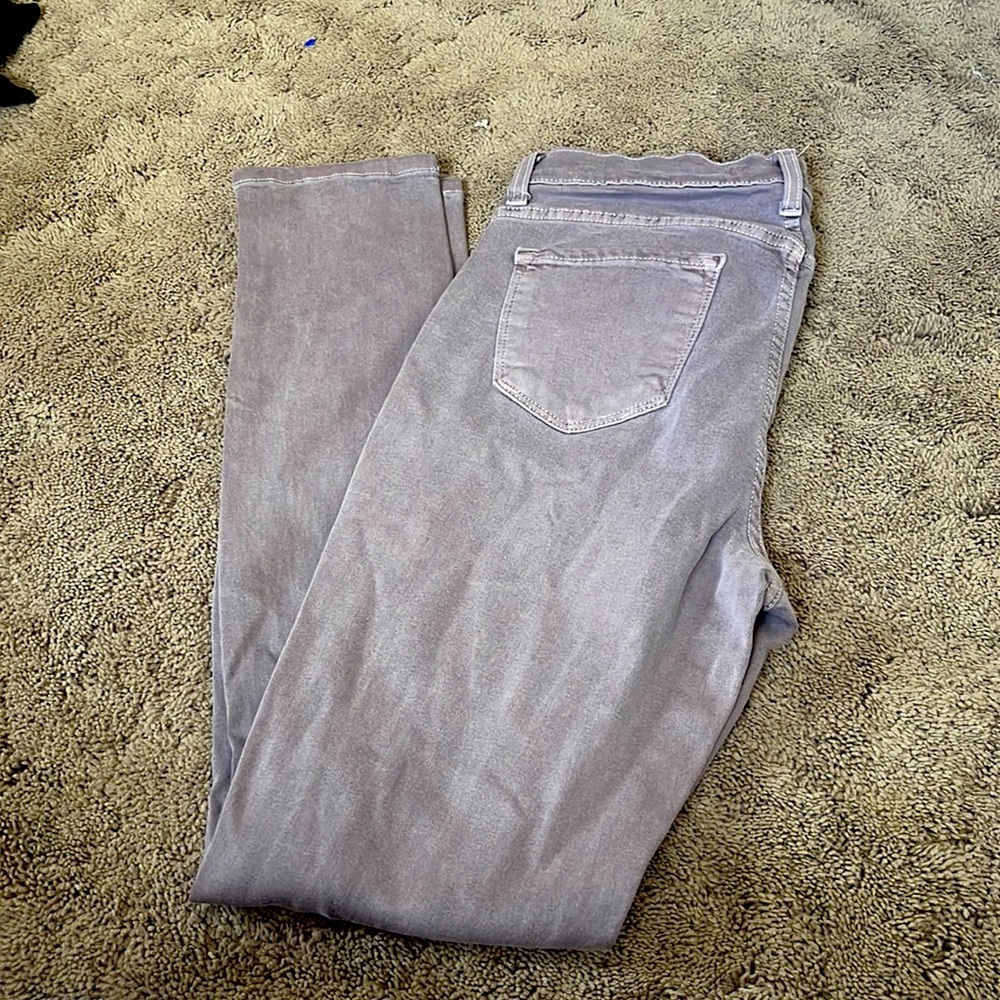 Color: light washed purple. Material: Denim stretchy and curve fitting jeans